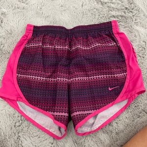 3 pairs of nike running shorts